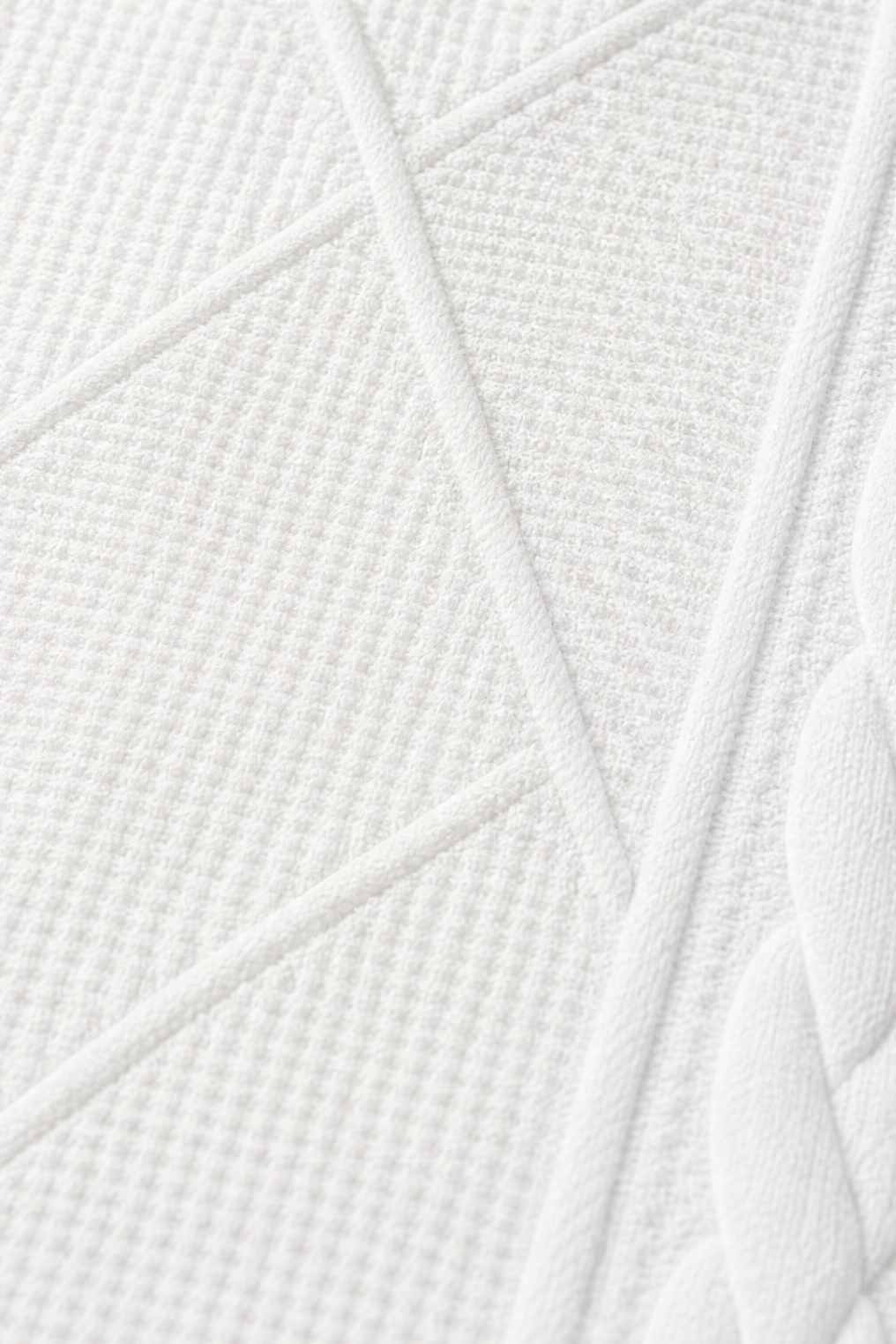 Détail du tissage texturé du blazer Blazéa